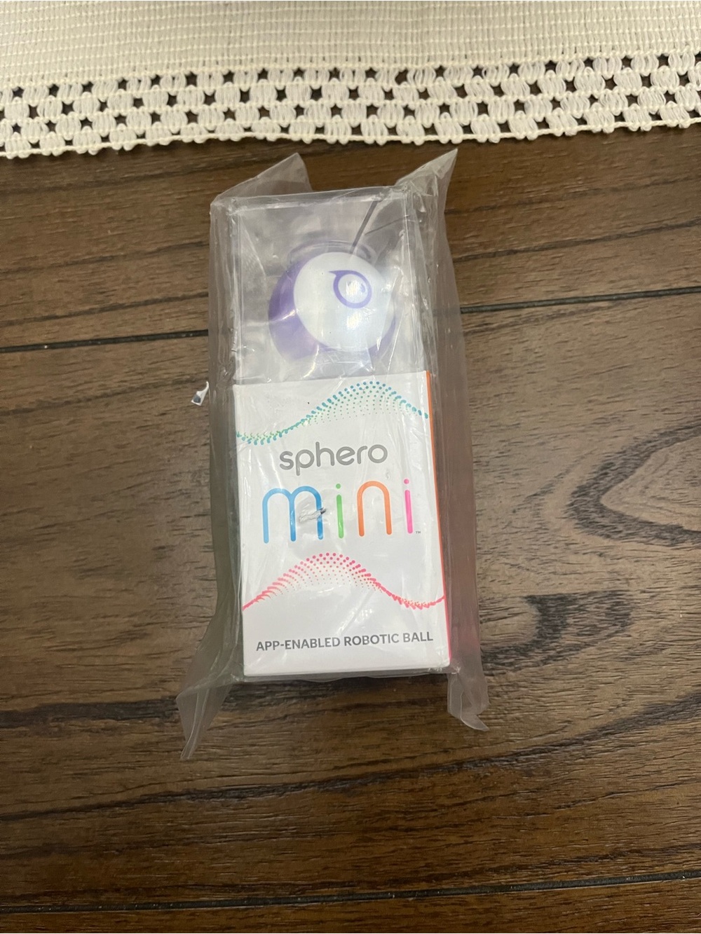 adidas white and purple spherical gadget